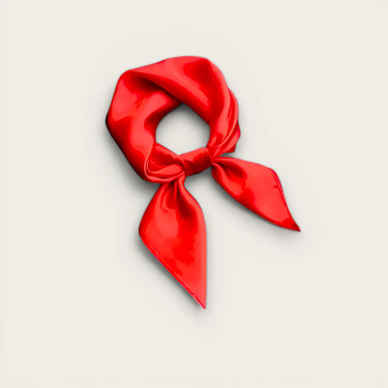 Vibrant red silk Plain Red Scarf tied in neat knot with glossy flowing ends