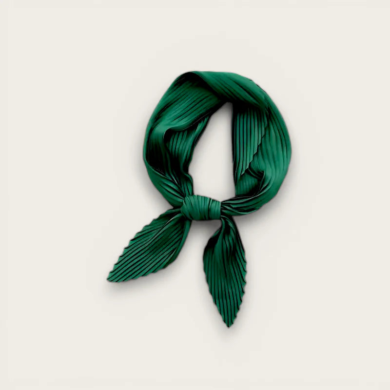 Pleated green scarf in emerald silk with neat knot