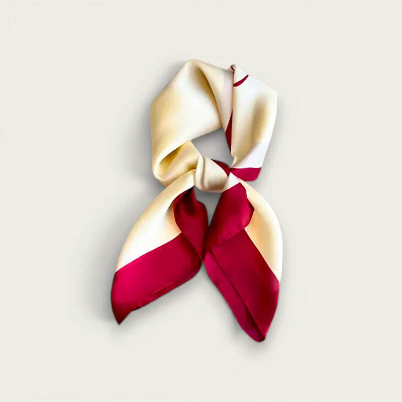 Red and white silk scarf in cream and burgundy with neat knot
