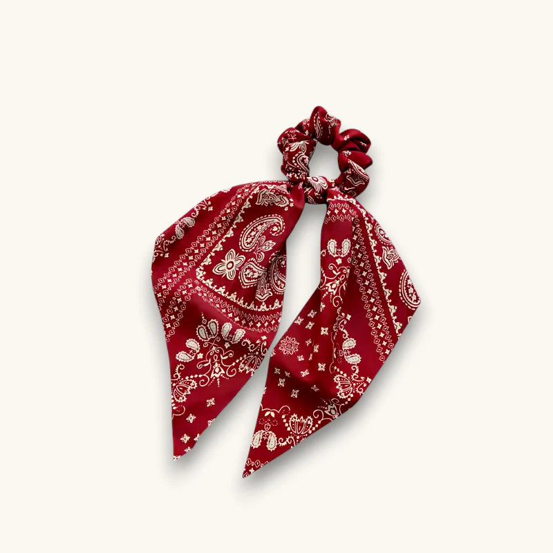 Red and white scarf scrunchie with paisley pattern and flowing tails