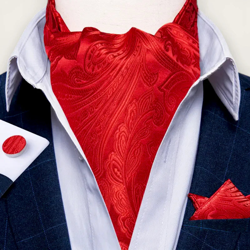 Red Ascot Scarf: vibrant red satin cravat with paisley pattern on neck