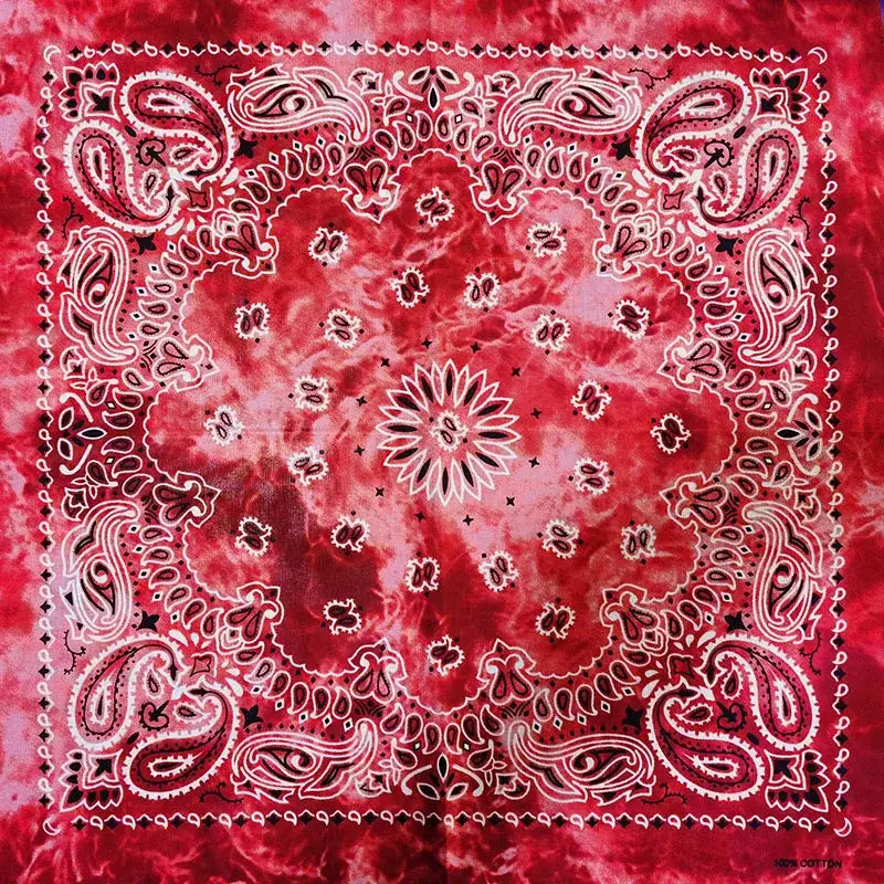 Red silk bandana with vibrant tie-dye paisley and floral patterns