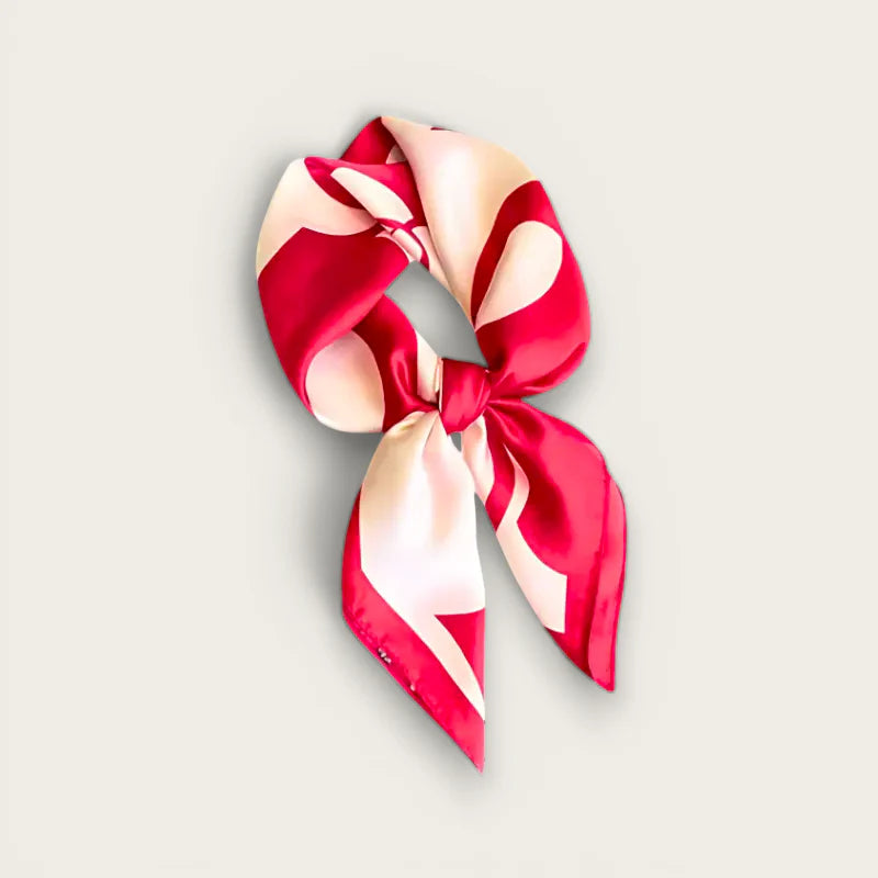 Red white silk scarf in vibrant red blush pink abstract pattern tied in bow