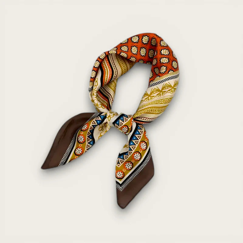 Retro Head Scarf: vibrant silk knot with orange, cream, gold, brown geometric patterns