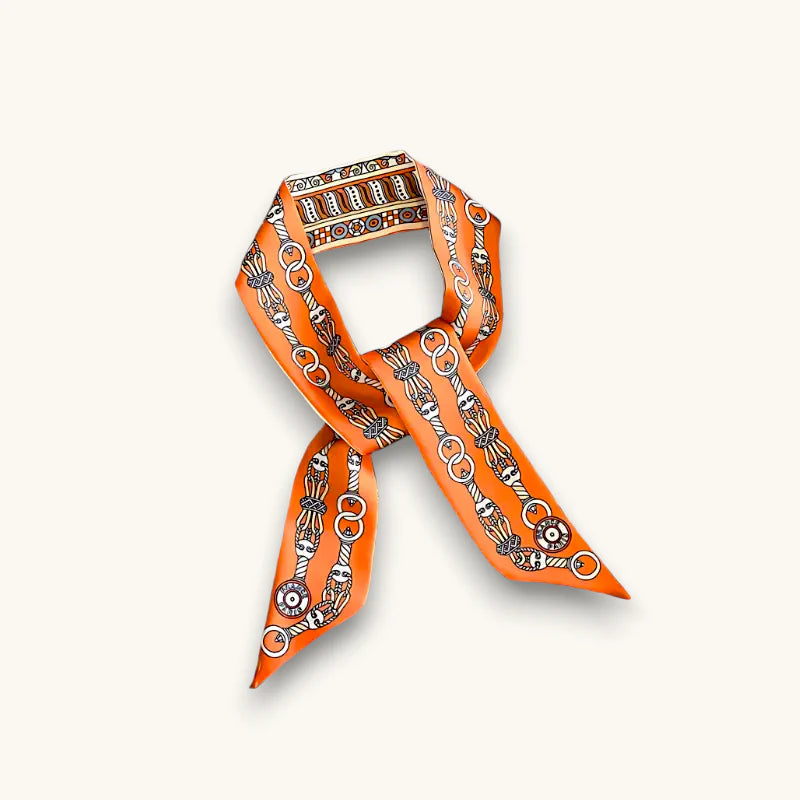 Vibrant orange Ribbon Scarf with chain links and stylized faces