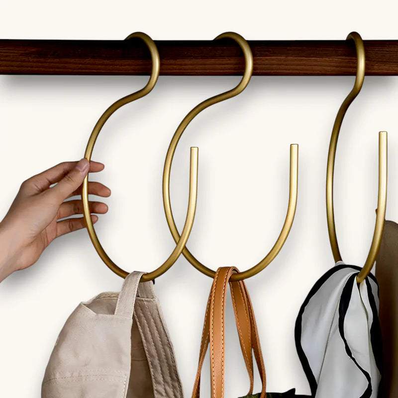 Round Scarf Hanger with gold-toned curved metal hooks on wooden rod
