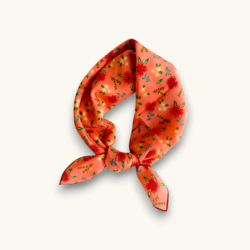 Salmon cotton scarf in coral silk with red floral pattern and knot
