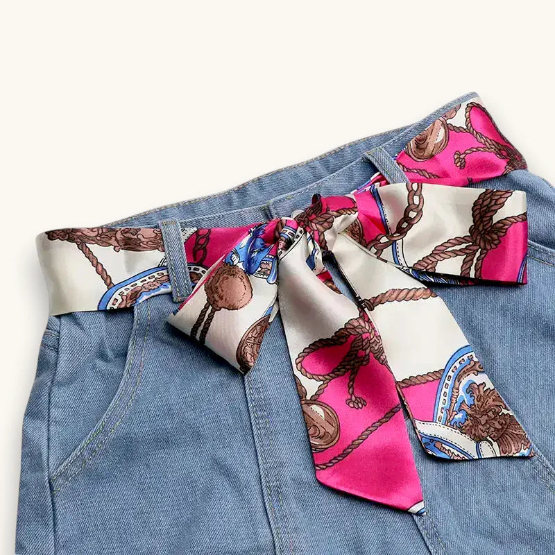 Scarf Belt 2000s: pink cream silk bow on denim shorts with nautical anchors