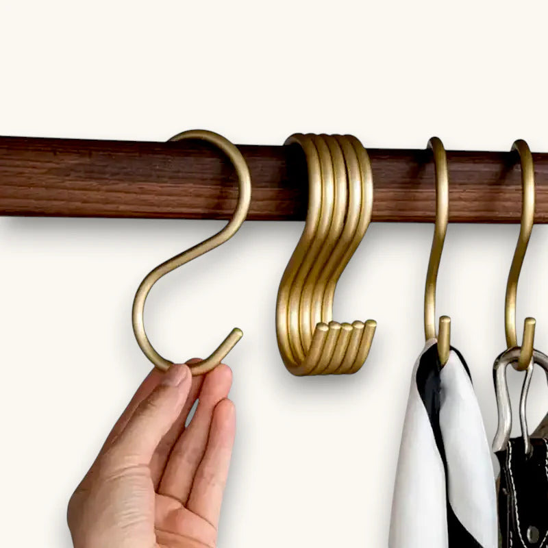 Gold S-shaped scarf hanger hooks, sleek modern metal design