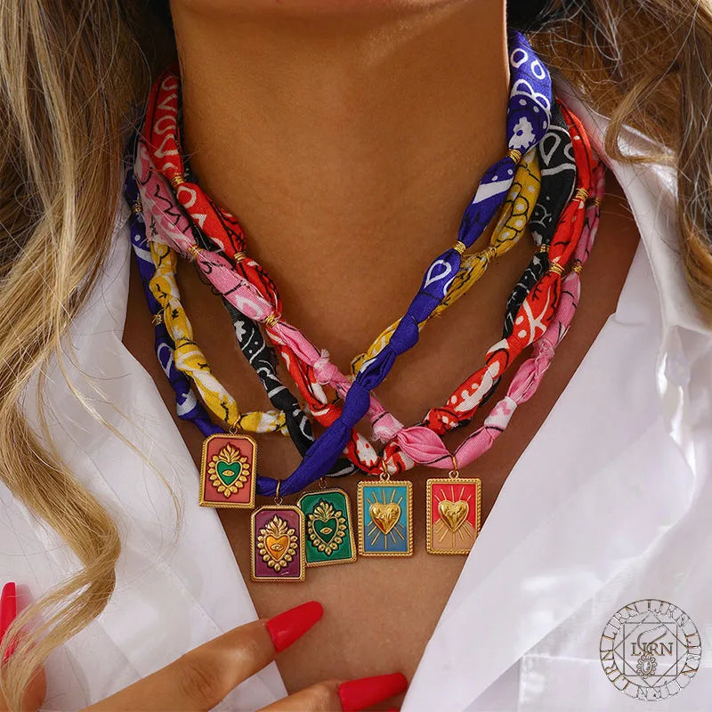 Scarf necklace pendant with colorful scarves, gold clasps, enamel heart pendants