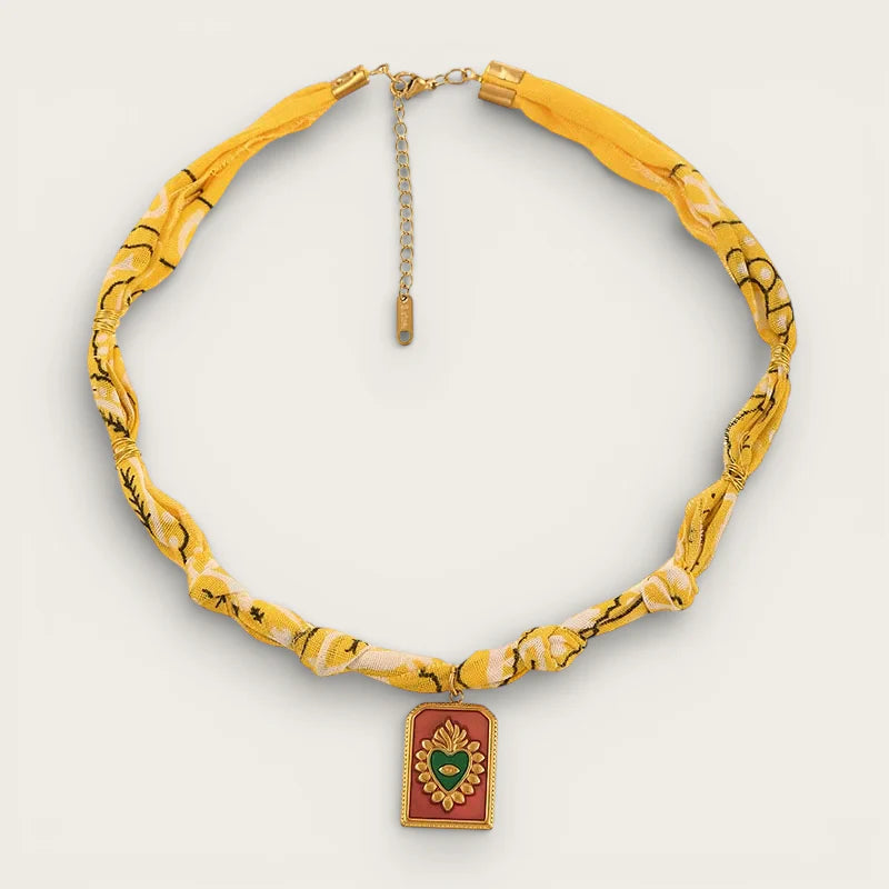 Vibrant yellow scarf necklace pendant choker with gold clasp, green heart on red