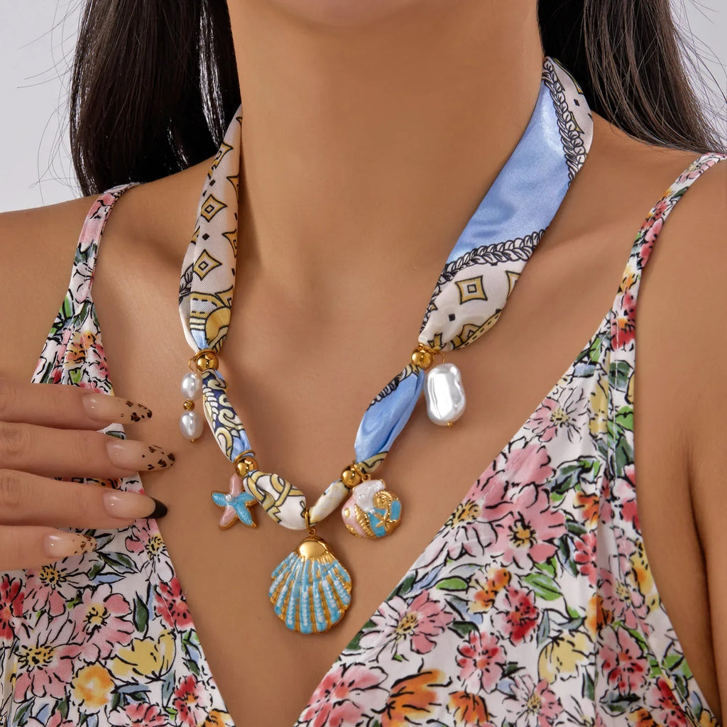 Scarf necklace with charm: colorful silk with seashell charms