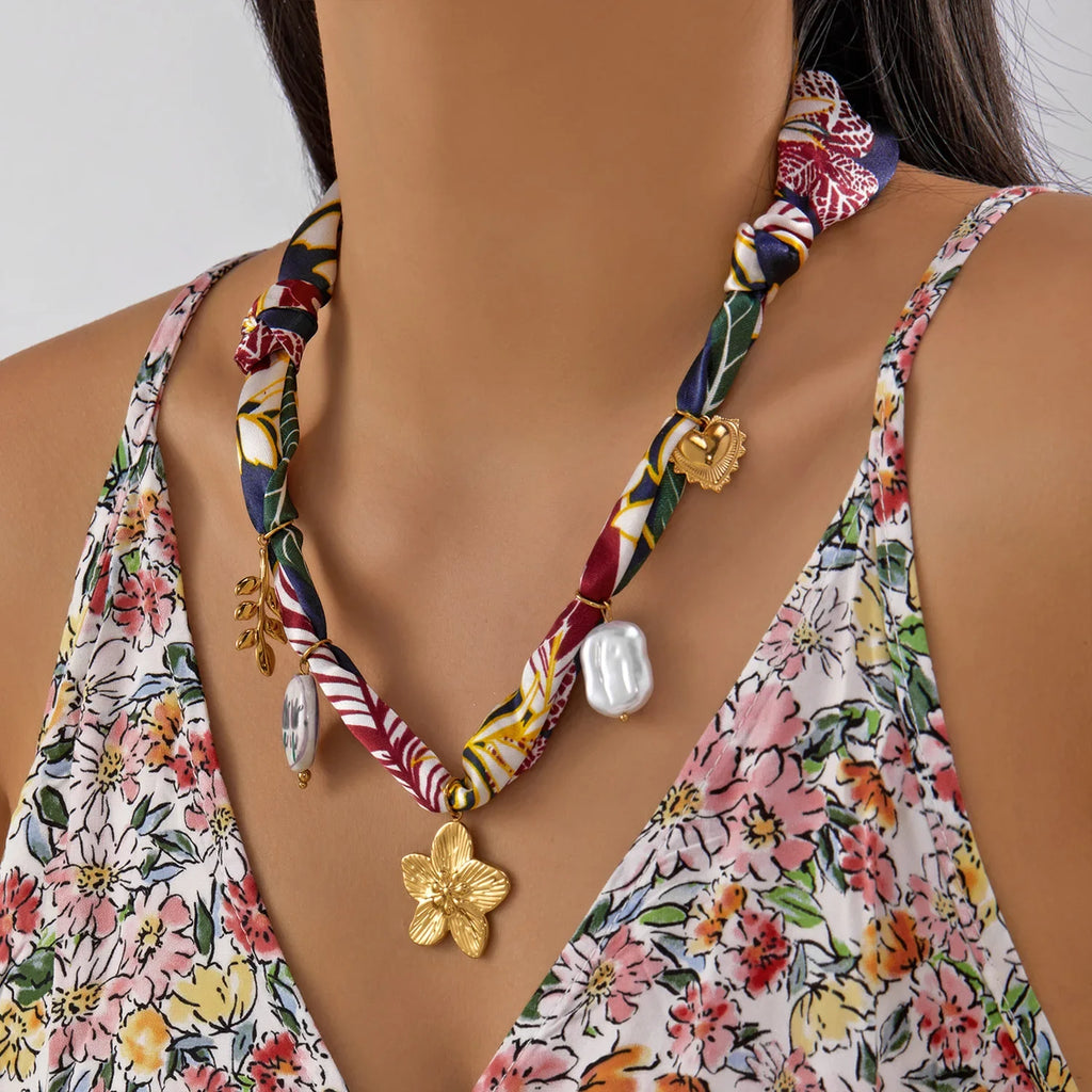 Vibrant multicolored floral silk scarf necklace with gold charms and flower pendant