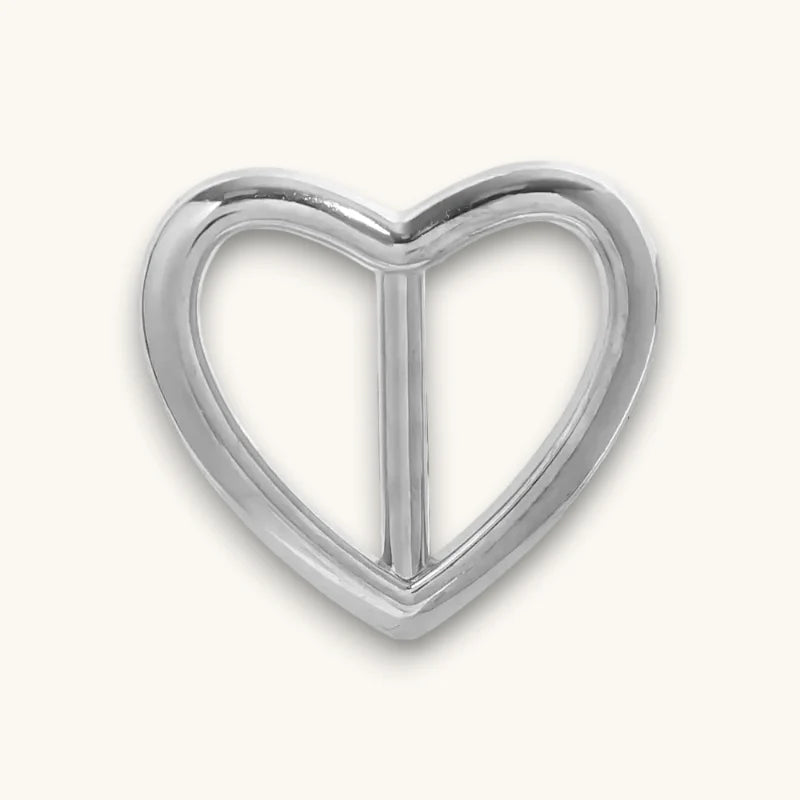 Silver heart-shaped metal scarf slide buckle with polished reflective finish