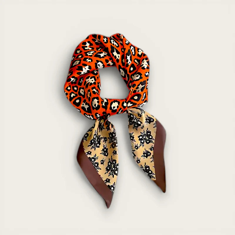 Silk Leopard Print Scarf with orange leopard pattern and beige floral ends