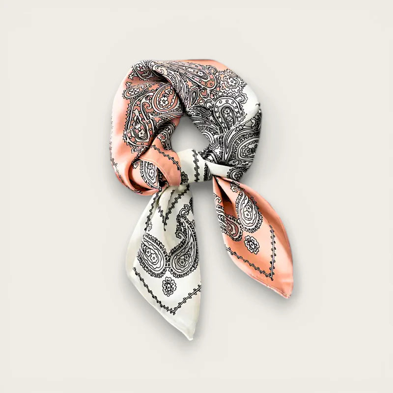 Silk neckerchief scarf in delicate peach white paisley with black details tied in knot