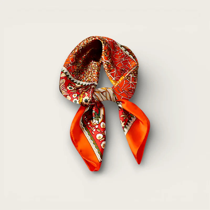 Small vibrant orange silk scarf with red floral patterns