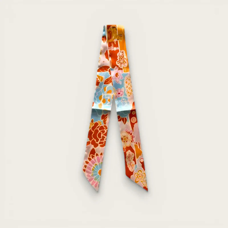 Small purse scarf with vibrant satin ribbon in orange, pink, blue floral pattern