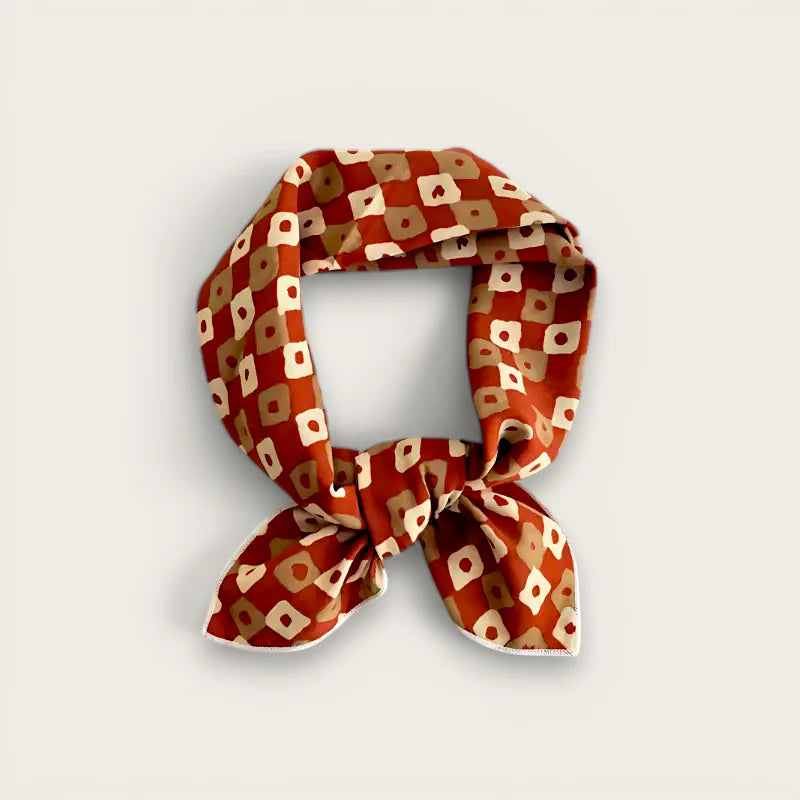 Square cotton scarf for women in rust silk with beige cream geometric squares knotted