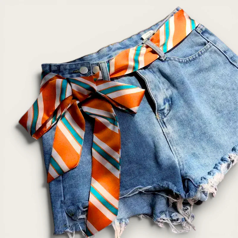 Blue denim shorts with orange white teal striped silk scarf belt bow