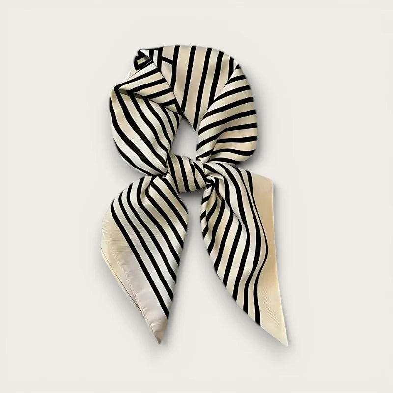 White black striped cream silk scarf tied in neat knot