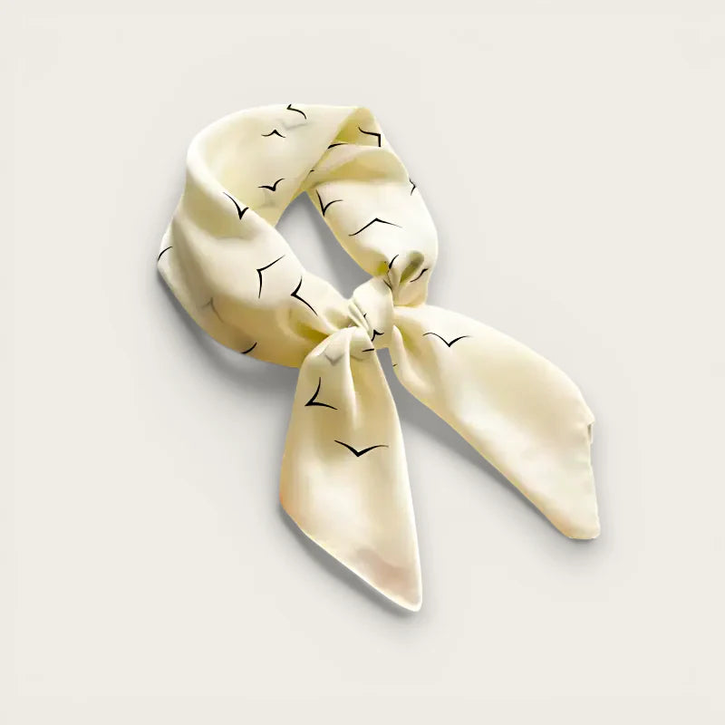 White head scarf: cream silk with black bird silhouettes in elegant knot