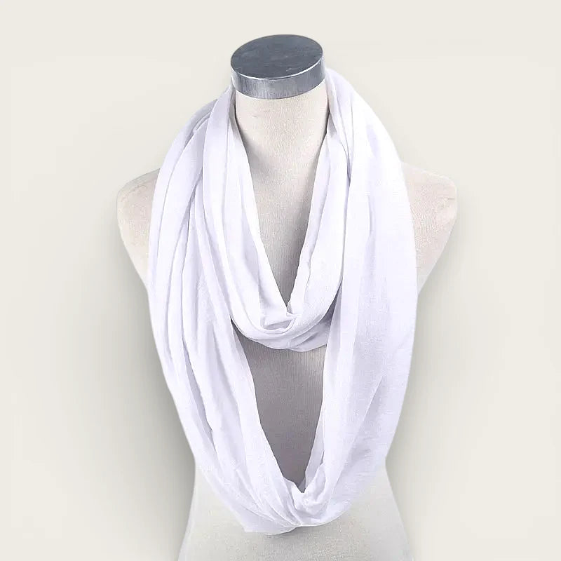 White infinity scarf draped around mannequin neck