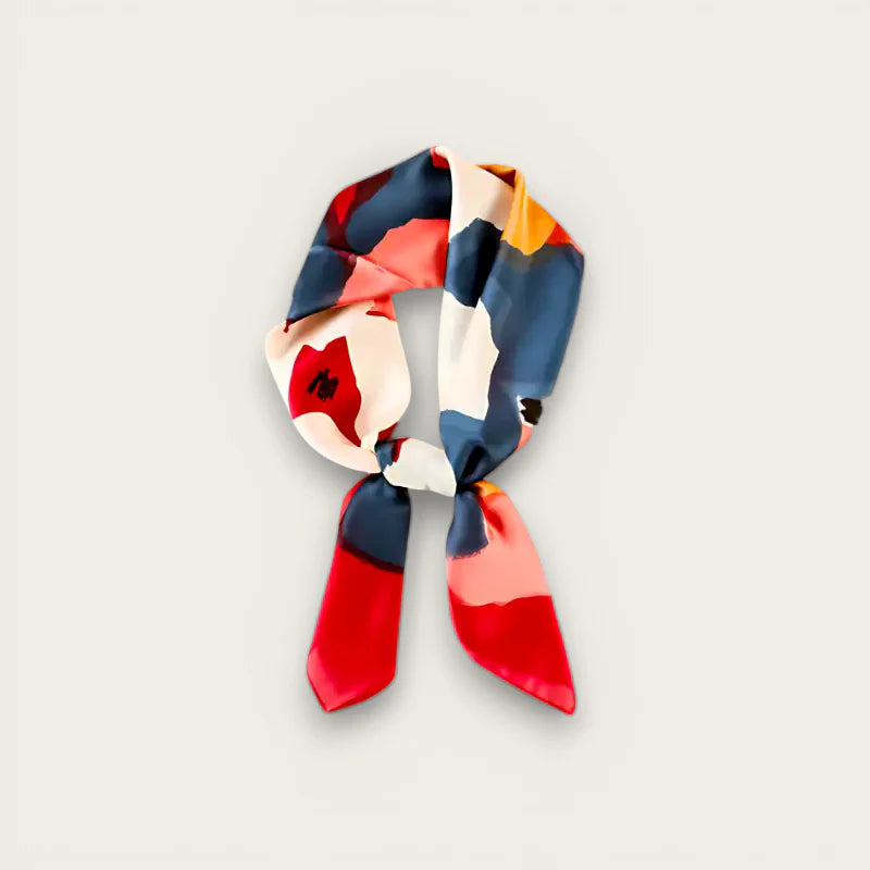 Womens colorful silk scarf with vibrant abstract patterns in red, blue, cream