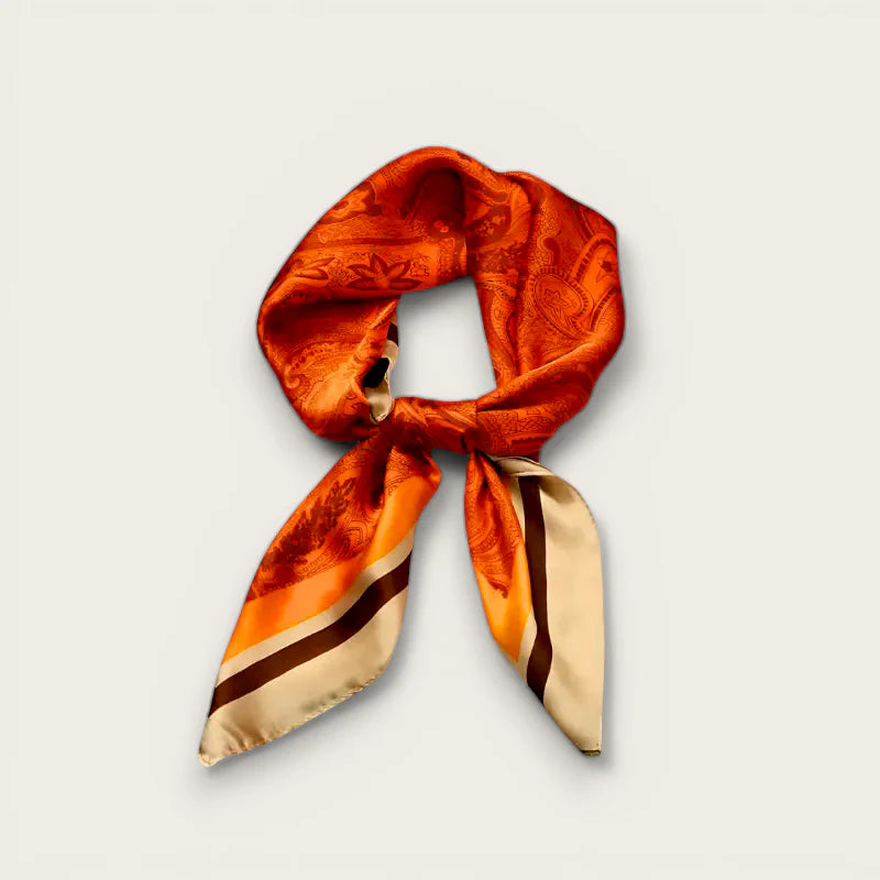 Womens evening scarf: vibrant orange silk with paisley pattern, cream edges, brown stripes