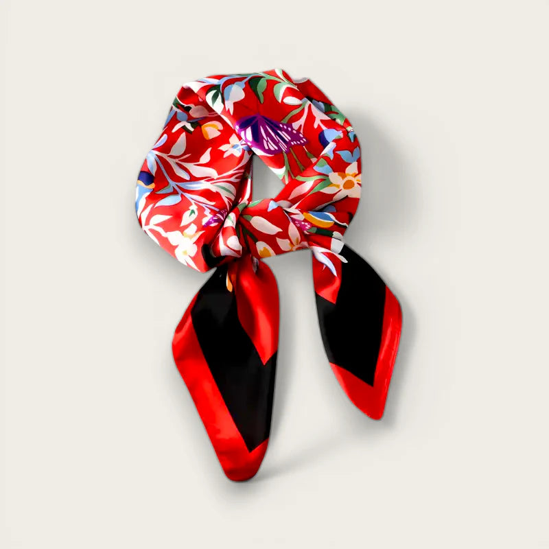 Womens red black scarf with vibrant floral pattern and elegant knot