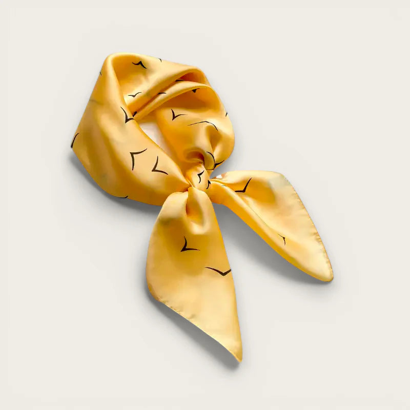 Yellow head scarf with vibrant yellow silk and delicate black bird pattern