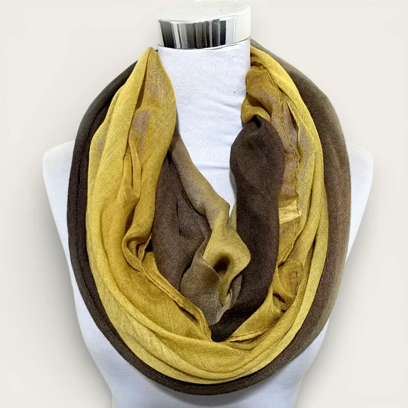 Yellow infinity scarf in soft mustard yellow to brown gradient