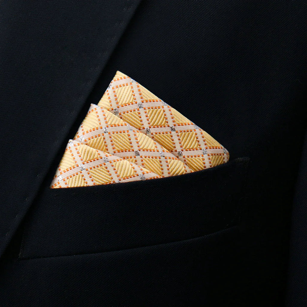 Neatly folded Yellow Pocket Square with geometric lines and metallic accents